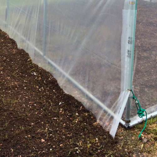 Fixation bâche enterrée